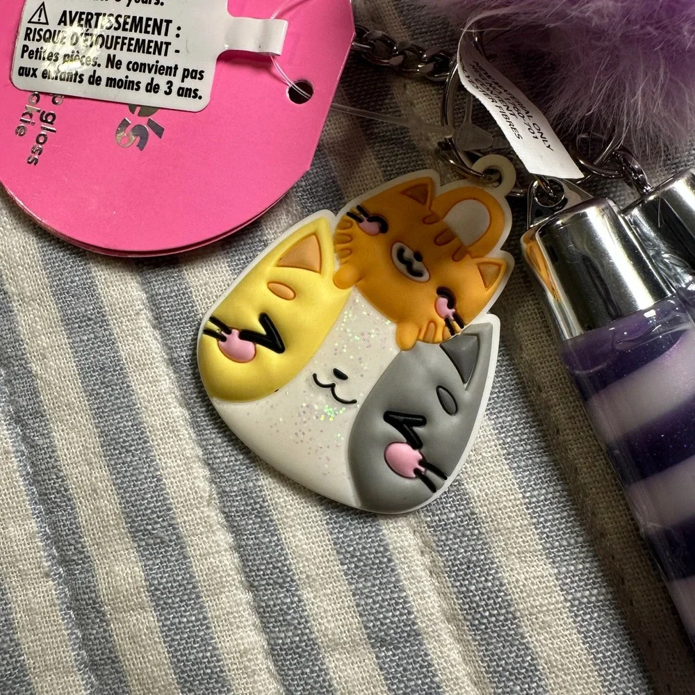 Claires Cookie Flavored Lip Gloss Keychain‎ Cat Pom Pom Purple Pink 64972-3 NEW